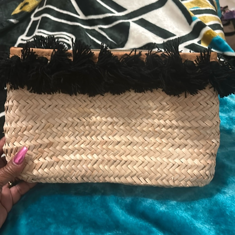 Clever Carriage company Moroccan tassel clutch